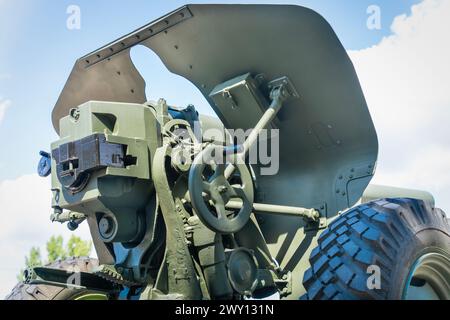 Green painted old Soviet 122 mm howitzer from the rear Stock Photo