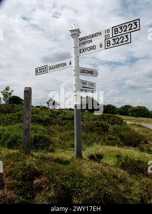 Signpost on Exmoor pointing directions towards Tarr Steps, Dulverton, Liscombe, Lynton and Exford in Devon.  England, UK. Stock Photo