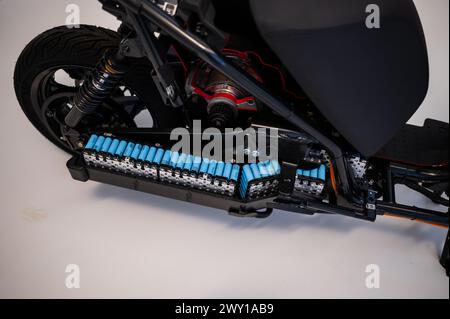 Ray 7.7 Electric Motorbike open in half.    Mobility City Technology Museum in Zaha Hadid’s Bridge (Bridge Pavilion), Zaragoza, Spain Stock Photo