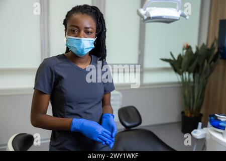 African american female dentist standing Stock Photo