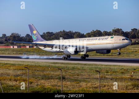 Saudi Arabian Airlines Airbus A330-343 (REG: HZ-AQB) arriving in the morning for maintenance at LTM. Stock Photo