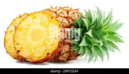 Ripe pineapple  and pineapple slices isolated on white background. File contains clipping path. Stock Photo