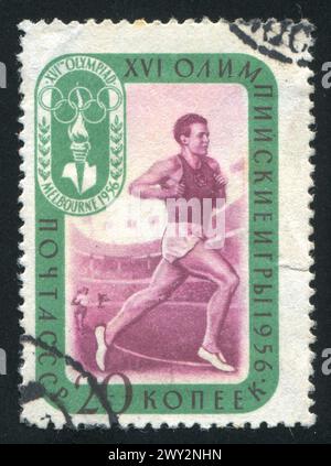 RUSSIA - CIRCA 1957: stamp printed by Russia, shows Sprinter, circa 1957 Stock Photo