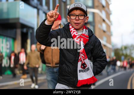 A Brentford fan outside the ground before the Premier League match at ...