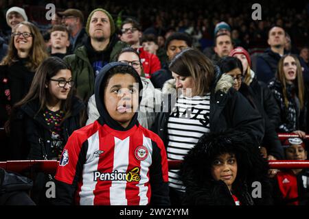 London, UK. 3rd Apr, 2024. Brentford fans during the Premier League match at Gtech Community Stadium, London. Picture credit should read: Kieran Cleeves/Sportimage Credit: Sportimage Ltd/Alamy Live News Stock Photo