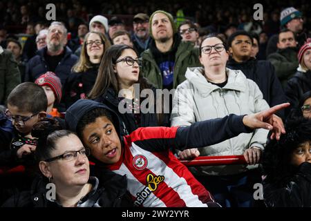 London, UK. 3rd Apr, 2024. Brentford fans during the Premier League match at Gtech Community Stadium, London. Picture credit should read: Kieran Cleeves/Sportimage Credit: Sportimage Ltd/Alamy Live News Stock Photo