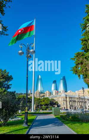 Flagpole with flag of Azerbaijan at seaside promenade in Baku Stock Photo