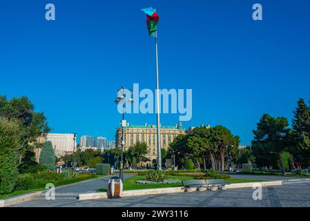 Flagpole with flag of Azerbaijan at seaside promenade in Baku Stock Photo