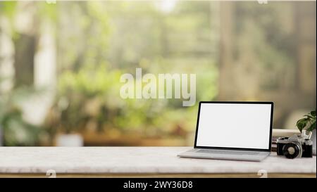 A white-screen laptop computer mockup on a white tabletop with a blurred background of a green garden. workspace close-up image. 3d render, 3d illustr Stock Photo