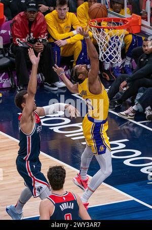 Washington, USA. 03rd Apr, 2024. WASHINGTON, DC - APRIL 03: Los Angeles Lakers guard Spencer Dinwiddie (26) shoots past Washington Wizards forward Patrick Baldwin Jr. (7) during a NBA game between the Washington Wizards and the Los Angeles Lakers, on April 03, 2024, at Capital One Arena, in Washington, DC. (Photo by Tony Quinn/SipaUSA) Credit: Sipa USA/Alamy Live News Stock Photo