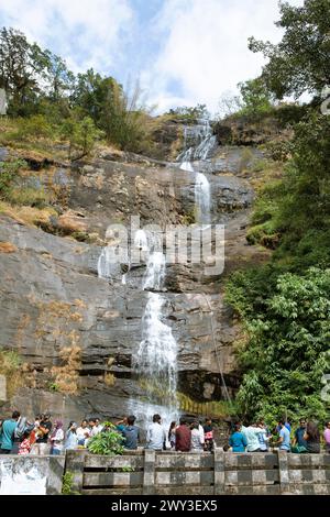 Indian people looking at the Cheeyappara waterfall, Idukki district, Kerala, India Stock Photo