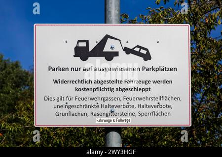 Sign, traffic sign, traffic sign, parking only in designated parking spaces, symbolic tow truck, letters, writing, traffic rules, parking rules on Stock Photo