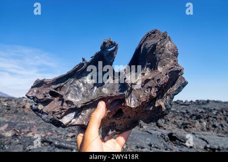 Variety of forms of basalt solidified lava (clinker): hawaiian is main type of lava (aa-lava). Viscous, dermolithic lava sampl (underside of the lava Stock Photo
