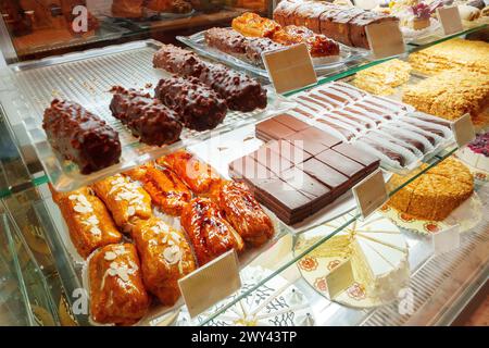 Delectable Assortment of Pastries and Sweets on Display at a Bakery Shop Stock Photo