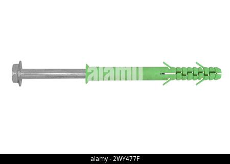 Macro shot yellow plastic dowel and self-tapping screw isolated on white background. Dowels. Wall plugs isolated on a white background. Yellow screw a Stock Photo