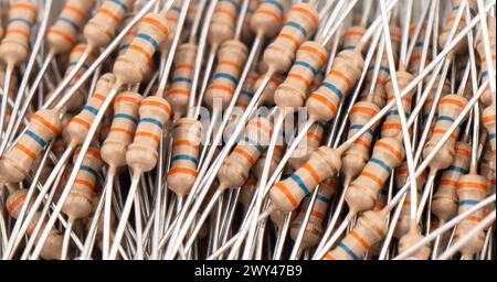 Electronic resistors texture background. Carbon film resistors background. Macro shot various electronic components Stock Photo