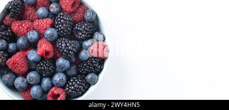 Fresh assortment berries isolated on white background Stock Photo