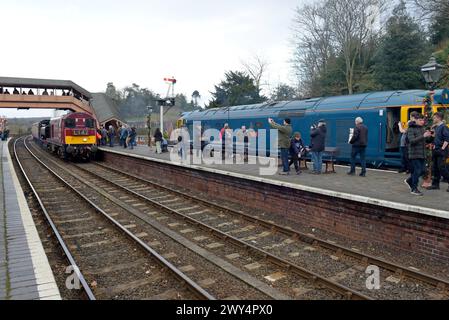 Railway enthusiasts at Bewdley Station on Severn Valley Diesel Day, with Class 50 50035 'Ark Royal' and Class 20 20142 'Sir John Betjeman' 29 Dec 2023 Stock Photo