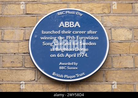 Brighton Dome, City of Brighton & Hove, East Sussex, UK.  This is the unvailing of a plaque celebrating the 50th anniversary of Abba winning the Eurovision Song Contest in 1974. Here in this picture is the plaque dedicated to the band outside the Brighton Dome Theatre. 4th April 2024. David Smith/Alamy live news Stock Photo