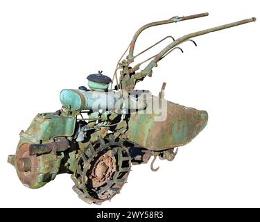 Old rusty vintage motor cultivator for plowing the soil. Isolated on white Stock Photo