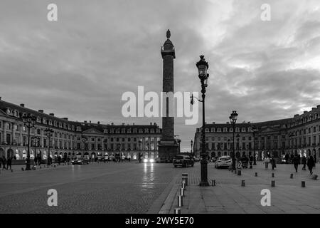 Paris, France - February 17, 2024 : Panoramic view of the illuminated Place Vendôme with its luxurious shops and hotels in Paris France Stock Photo