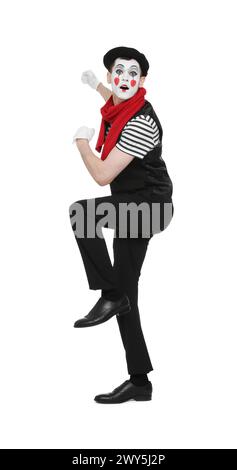 Funny mime artist in beret posing on white background Stock Photo