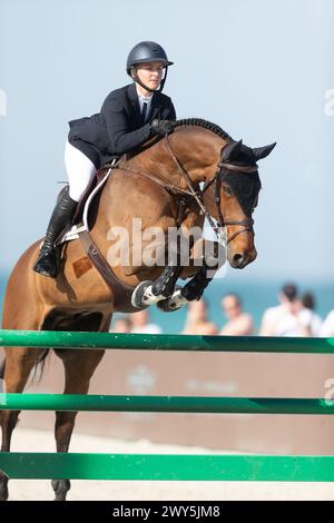 A rider and horse compete during the Longines Global Champions Tour ...
