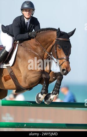 A rider and horse compete during the Longines Global Champions Tour ...