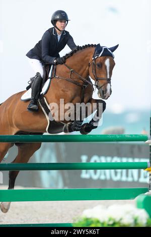 A rider and horse compete during the Longines Global Champions Tour ...