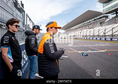 Suzuka Circuit, 4 April 2024: Jack Doohan, Esteban Ocon (FRA) of Alpine and Oscar Piastri (AUS) of McLaren race remote controlled cars during the 2024 Japan Formula One Grand Prix. corleve/Alamy Live News Stock Photo
