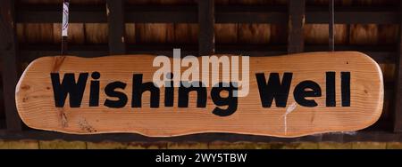 A Wishing Well sign at Paignton Zoo. Stock Photo