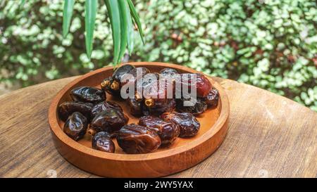 closeup sweet dried date palm fruits or kurma, ramadan food Stock Photo