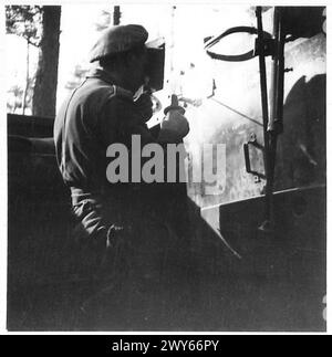 BRITISH FLAG FIRST TO CROSS RHINE IN TWO WARS - Lieut. Colonel Jolly wishing his men the best of luck in the coming operations. , British Army, 21st Army Group Stock Photo