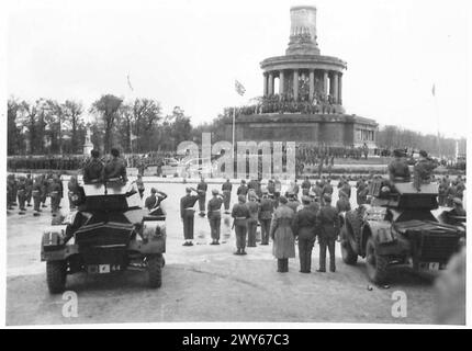 BREAKING THE FLAG CEREMONY IN BERLIN [7TH ARMOURED DIVISION] - The Union Jack flying at the base of the column after being broken by CSM E.Cole. , British Army, 21st Army Group Stock Photo