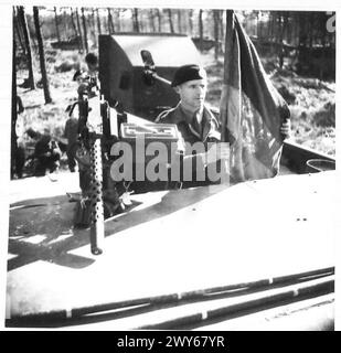 BRITISH FLAG FIRST TO CROSS RHINE IN TWO WARS - RSM Halstead of Rochdale, fixing the flag in the Buffalo ready for carrying across the Rhine. , British Army, 21st Army Group Stock Photo