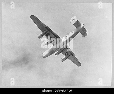 DEFEATING GERMANY'S KEY WEAPON : LIBERATOR v. U-BOAT - For story see CH.9576 (Picture issued 1943) A Liberator returns after 16 hours out on patrol. , Royal Air Force Stock Photo