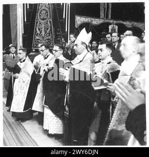 CEREMONIAL FUNERAL OF BRUSSELS POLICE SHOT BY THE GERMANS - The Archbishop conducting the Service , British Army, 21st Army Group Stock Photo