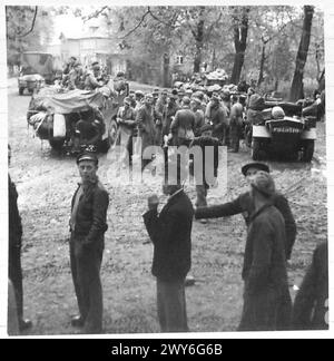 AMERICAN AIRMEN PRISONERS LIBERATED AT GUDOW TODAY - Scenes in the town of Gudow where hundreds of Germans surrendered today and gave up some 1,400 American prisoners of war. , British Army, 21st Army Group Stock Photo