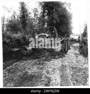 Royal Engineers of 615th Field Squadron work on widening a road in ...