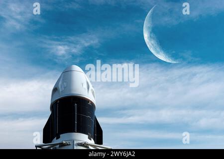 Cargo spacecraft launch on sky background with Moon. Elements of this image furnished by NASA. Stock Photo