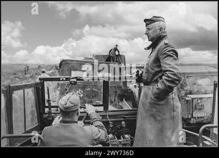 VON MANSTEIN  WW2 The commander of the 11th Army of the Wehrmacht , Infantry General Erich von Manstein (11/24/1887 - 06/10/1973) on the Crimean front in his staff car. In September 1941 Manstein was appointed commander of the 11th Army after its previous commander, Colonel-General Eugen Ritter von Schobert, perished when his plane landed in a Soviet minefield. The 11th Army was tasked with invading the Crimean Peninsula, capturing Sevastopol, and pursuing enemy forces on the flank of Army Group South during its advance into the Soviet Union. Stock Photo