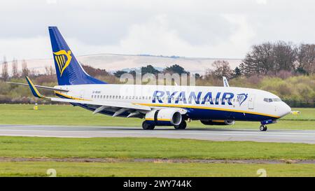 Ryanair Boeing 737-8AS pictured slowing on the runway at Manchester Airport on 4 April 2024. Stock Photo