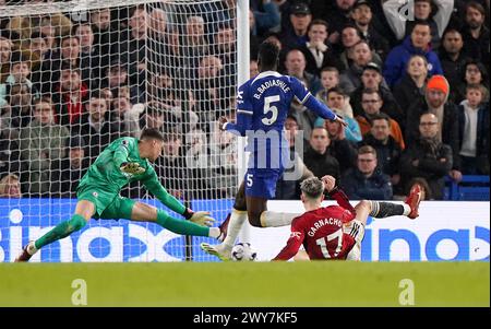 Manchester United's Alejandro Garnacho scores their first goal of the game during the Premier League match at Stamford Bridge, London. Picture date: Thursday April 4, 2024. Stock Photo