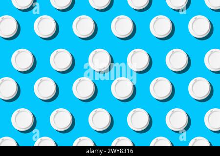 Seamless Repeated Pattern of a Disposable Coffee Cup on a Blue Background Stock Photo