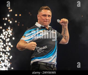 Gerwyn Price celebrates winning night 6 with his trophy during the ...