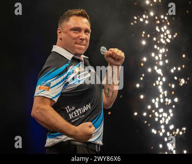 Gerwyn Price celebrates winning the final against Luke Littler during ...