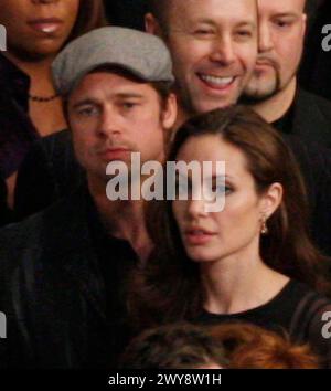 Brad Pitt and Angelina Jolie at 'Undefeated' Floyd Mayweather VS. Ricky Hatton at The MGM Grand Garden Arena, Las Vegas, Nevada. December 8, 2007. Credit: Erik Kabik Photography/MediaPunch Stock Photo