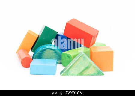 Colorful wooden square, rectangular,triangle, cylindrical and geometry shapes blocks on white background Stock Photo