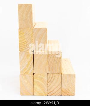 Blank wooden bars moving up or down stairs on white isolated background Stock Photo