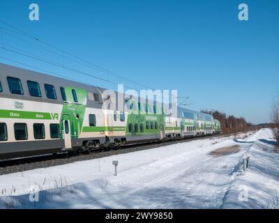 Pendolino train in early spring scene, Kempele Finland Stock Photo